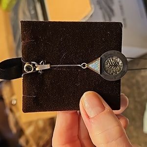 18k pendant with ancient coin and precious stones.